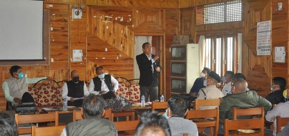 Minister Neiba Kronu addressing the monthly meeting of Phek DPDB held at Phek DPDB hall on July 6. (DIPR Photo)